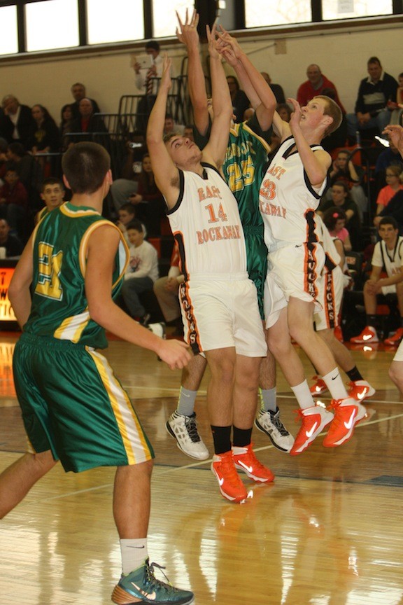 Damian Amiruddin and Armin Cekic battle for a rebound.