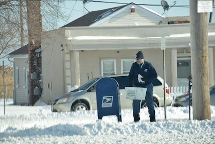 Neither snow nor rain nor heat nor gloom of night stayed this courier from delivering in Oceanside.