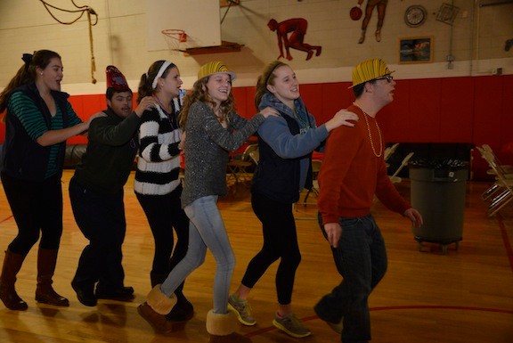 Everyone danced the Conga line in the South Side High School gym.
