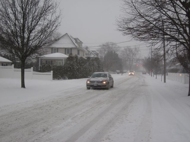 Cars struggled to reach speeds of more than 15 miles per hour early Tuesday evening as snow continued to fall.