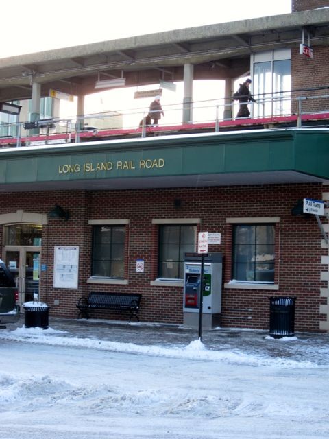 Commuters rushed from the escalators to the covered seating area at the LIRR station to avoid the 36 mph winds.