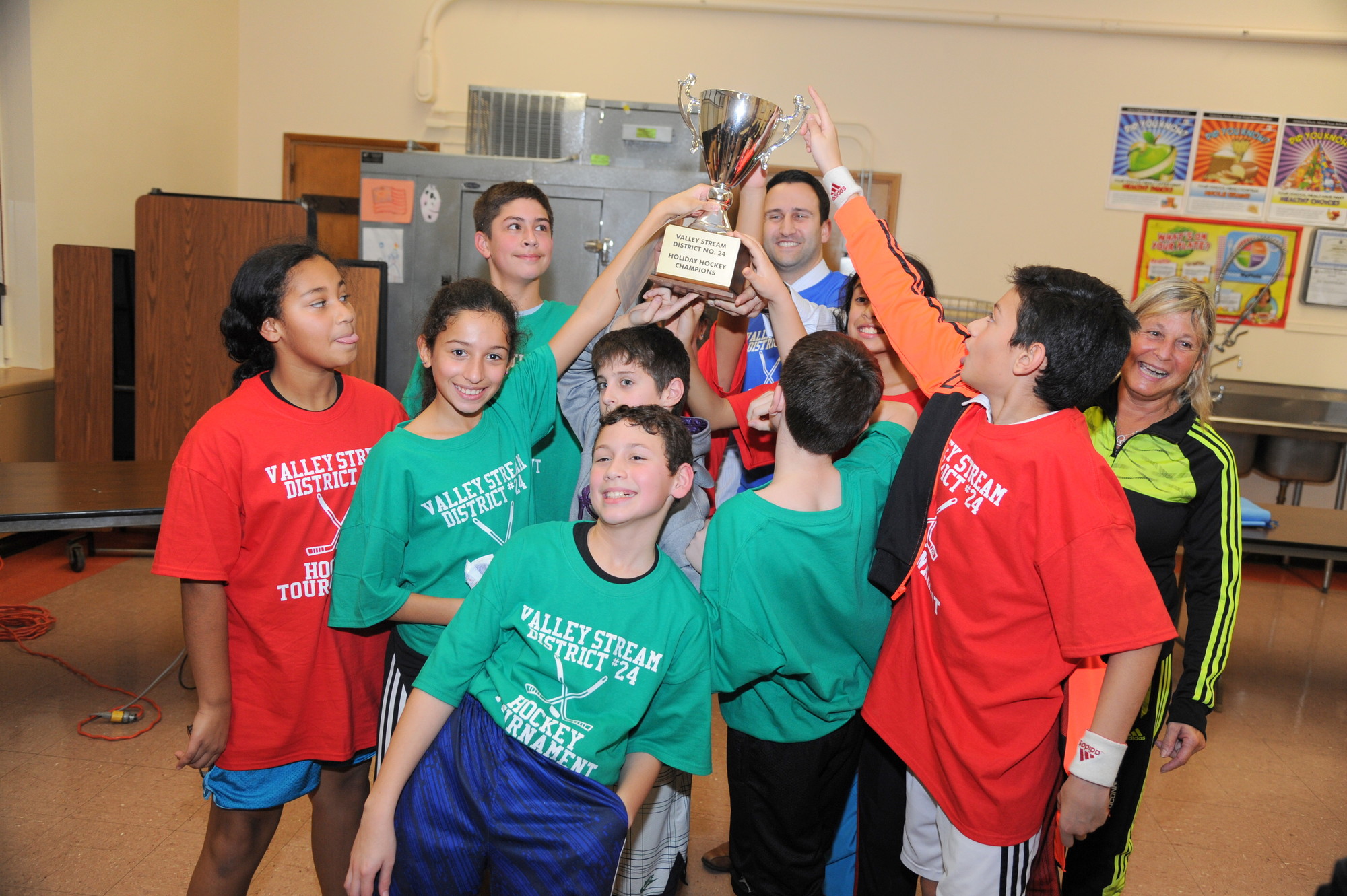Students From the Robert W. Carbonaro School celebrated their victory in District 24’s annual floor hockey tournament on Jan. 14.