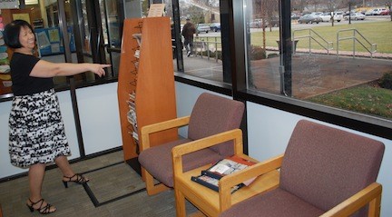 Mamie Eng, director of the Henry Waldinger Memorial Library, shows were a new counter-top seating area will be created.