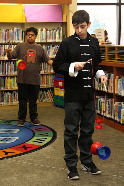 Zach Zemel and Jerry Merchan, members of South’s Cultural Society, demonstrated Chinese yo-yos at the Henry Waldinger Memorial Library.