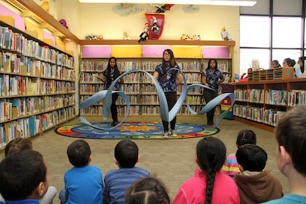 South High School Cultural Society members, from left, Maya Voytelmgum, Kayla Pascual and Valerie Pascuzzi performed a Chinese Ribbon Dance for children at the Henry Waldinger Memorial Library last Saturday afternoon to celebrate the new year.