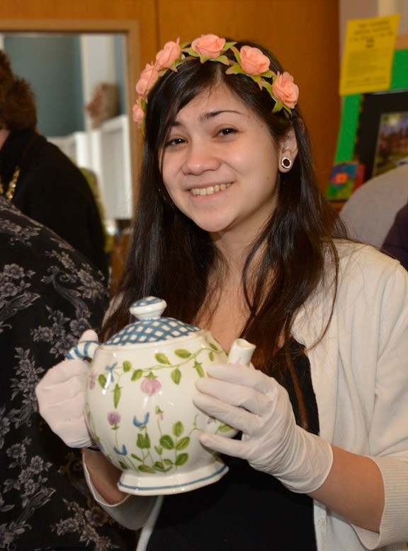 Key Club member Courtney Chichester served tea at the Lynbrook library for the historical society 1920’s themed tea party.