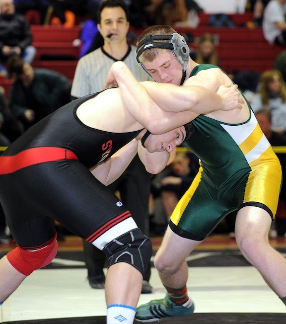Lynbrook's Chris Francia, right, continued his big season on the mats by winning the 195-pound title at last Saturday's Nassau Qualifying Tournament hosted by Syosset.