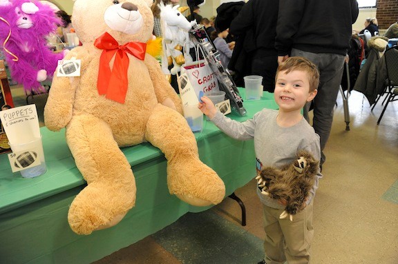 Tyler Grossman, 4, tried to win the biggest stuffed animal he could in the raffle.
