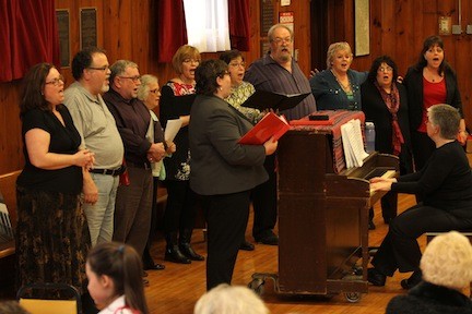 Pam Murano and Company sing "Tomorrow."