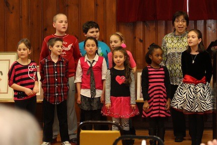 Chris Tarpinian and the St. James Sunday School children sing "Put You Hand in the Hand."