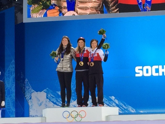 Devin Logan, left, with her silver medal, stands on the Medalist podium with Canadians Dara Howell, who took the gold, and Kim Lamarre, the bronze winner.