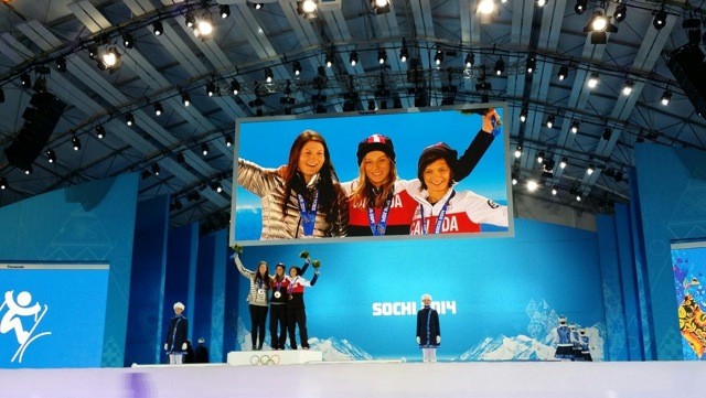 Devin Logan, left, on the podium in Sochi with her silver medal, alongside Canadian medalists Dara Howell (gold) and Kim Lamarre (silver)