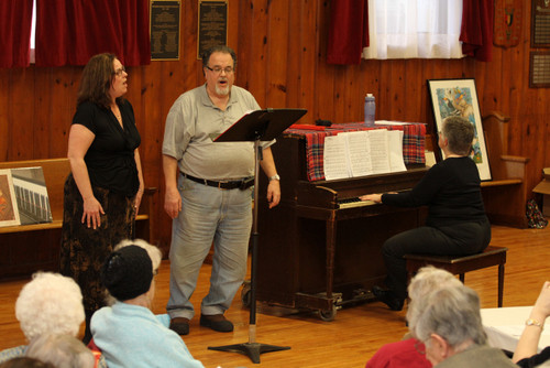 Patricia Gallagher and Andy Schwartz sing "Somewhere."