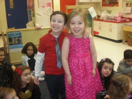 Matthew Caparatta and Alexandria Sundquist, dressed in a red shirt and tie and a pink dress, showed that they were good buddies.