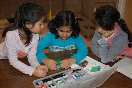 Using Legos to build their motorized machine were, from left, Kimberly Wong, Sonia Zahid and Jean Rimbos.