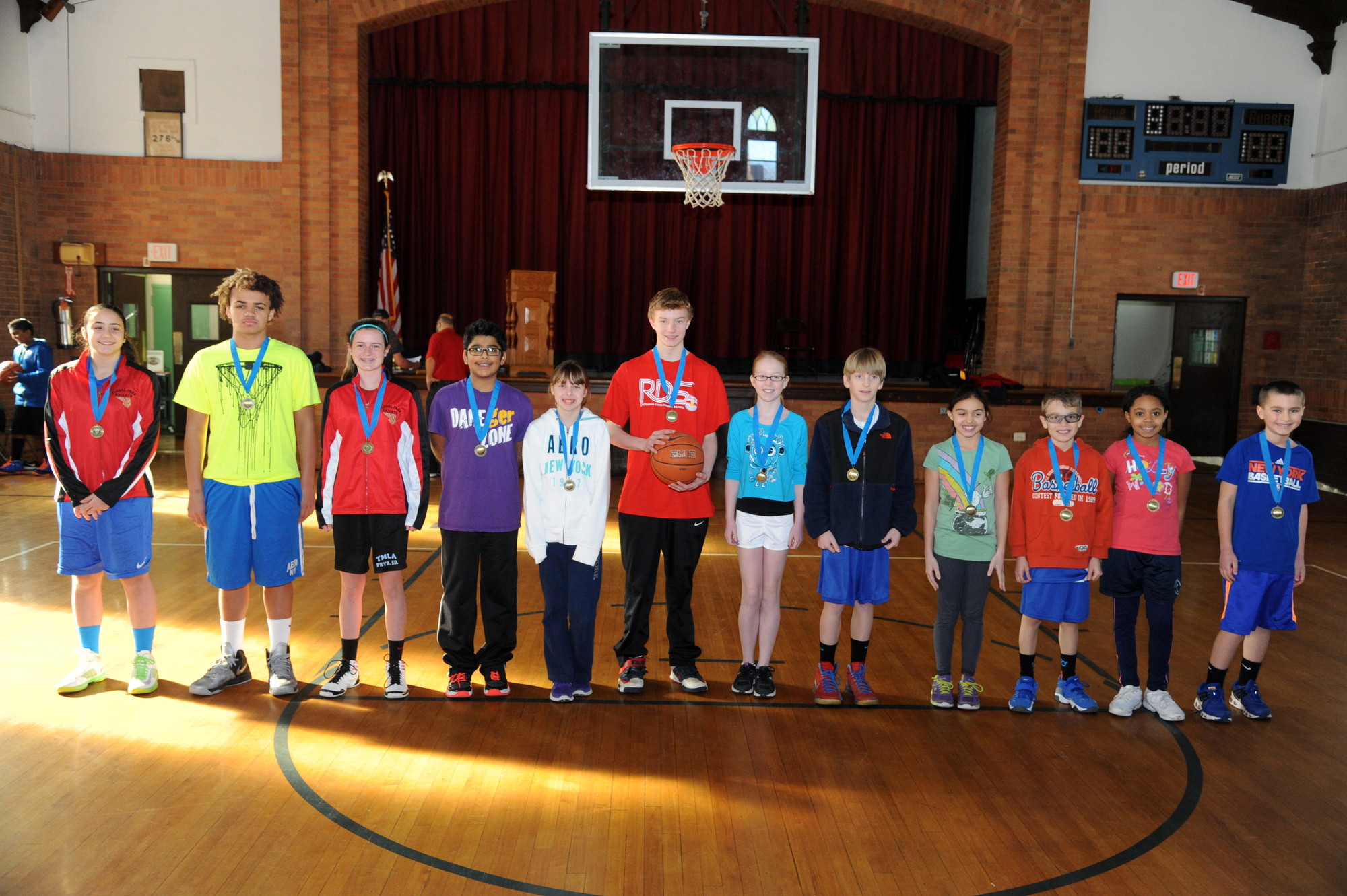 The winner in second second round of the Free-Throw Competition, from left, Danielle Devito, Tyler McCray, Maeve McGovern, Joel Thomas, Kate Grande, Bobby Bressmer, Rachel Wagner, Sean Colbert, Emily Saracino, Katherine Sinclair and Matthew Wallach.