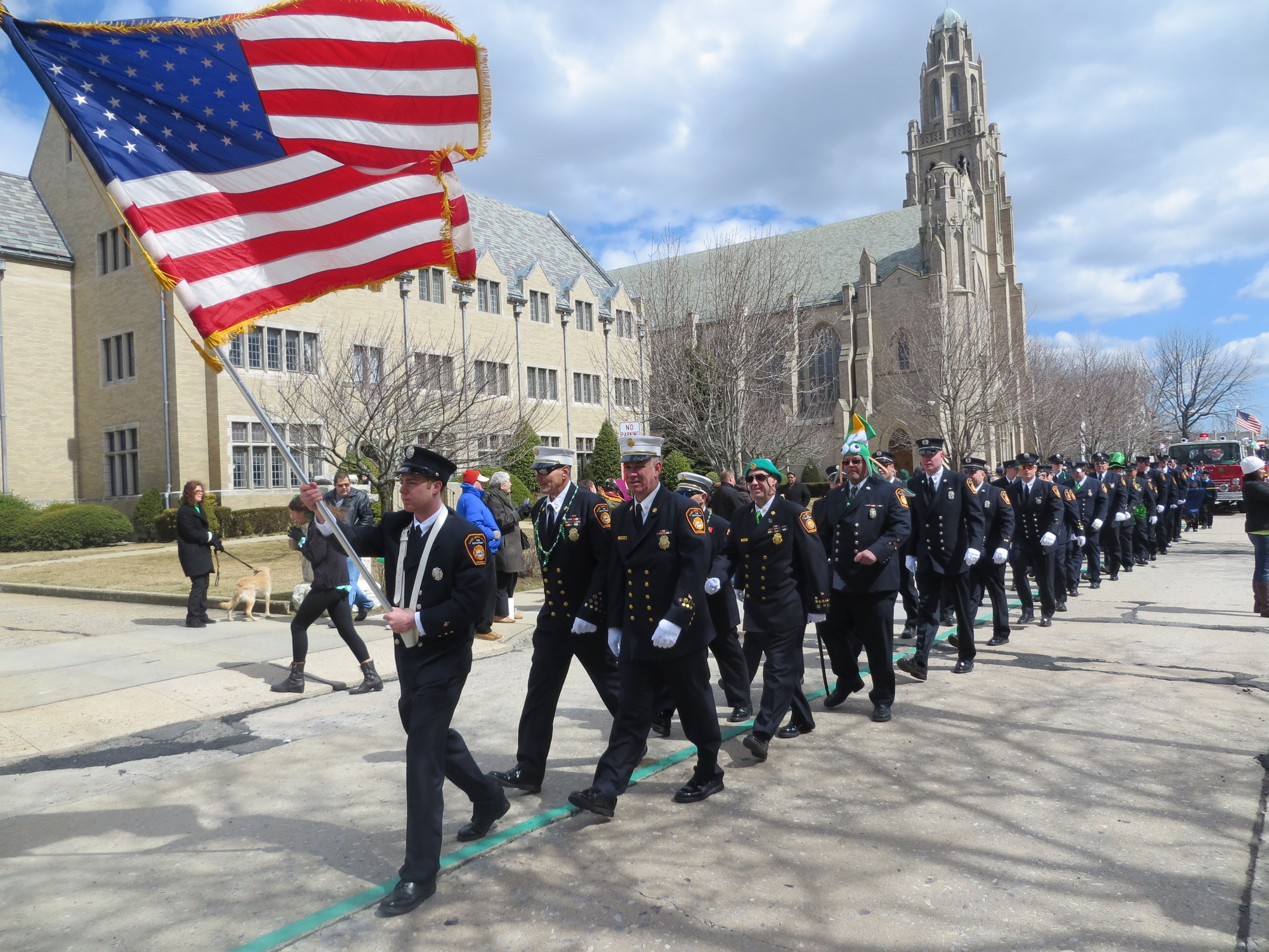 Local fire departments marched past St. Agnes Cathedal in last year's parade.