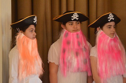 Hewitt students played pirates with beards of many colors.