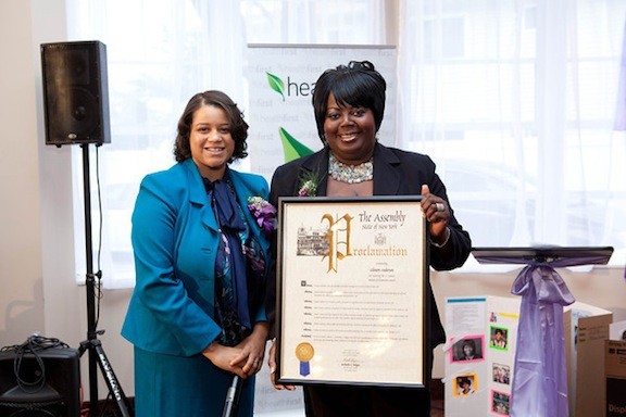 TD Bank branch Manager Glenore Anderson, right, was among six women honored by Assemblywoman Solages on March 23.