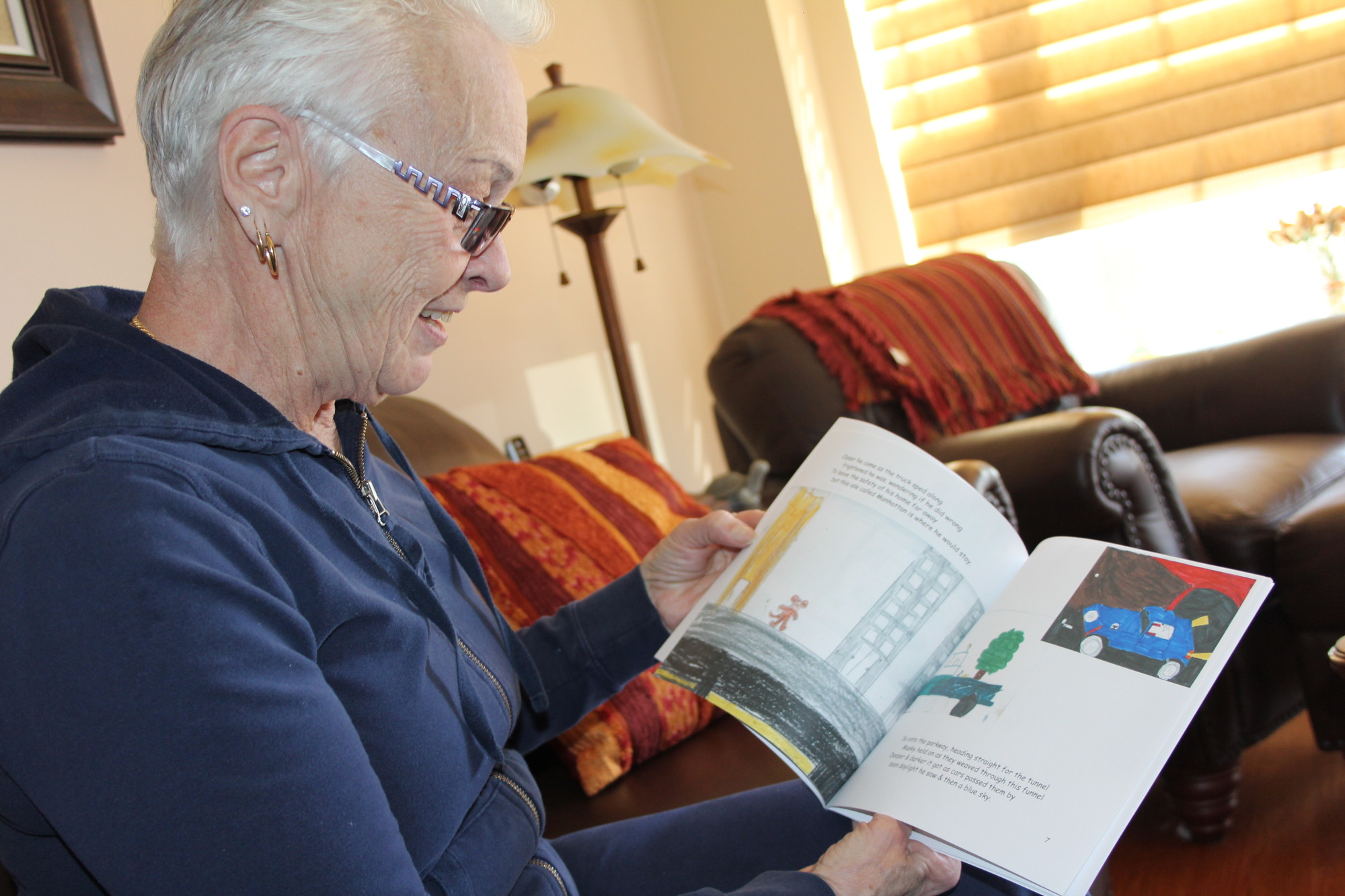 Susanne Giuliani, 68, a resident at the Seasons at East Meadow, published a children’s book, “Musky,” featuring illustrations by Oceanside elementary students.