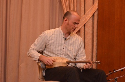Brandon Todiz performing during the concert.  He plays the oud and nigoni.