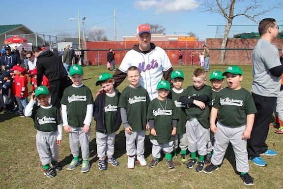 The Green Team lining up to take a photo at the East Rockaway Little League April 5th