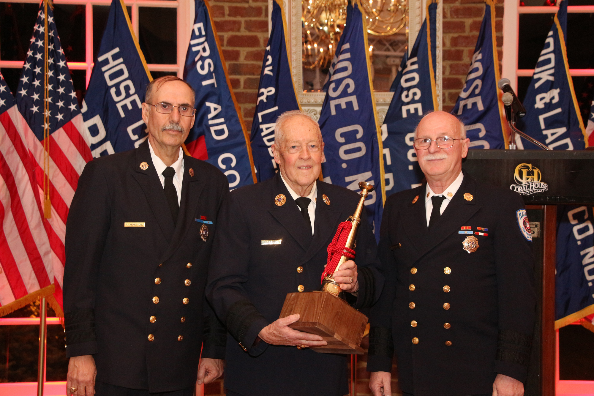 Ex-cheif norm Abrams, center, was honored for his 60 years of service to the department. With him are commissioners Paul A. Yanantuono, left, and Robert Quackerbush.