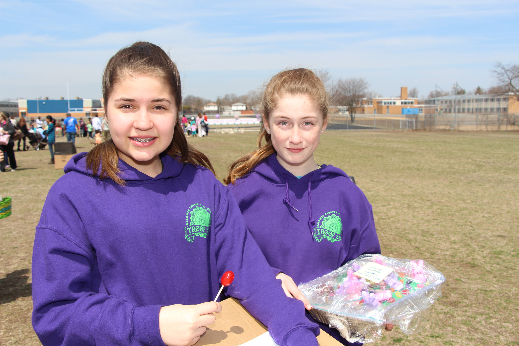 Grace Houser, left, and Shannon Dempsey helped many young children with some ball games.