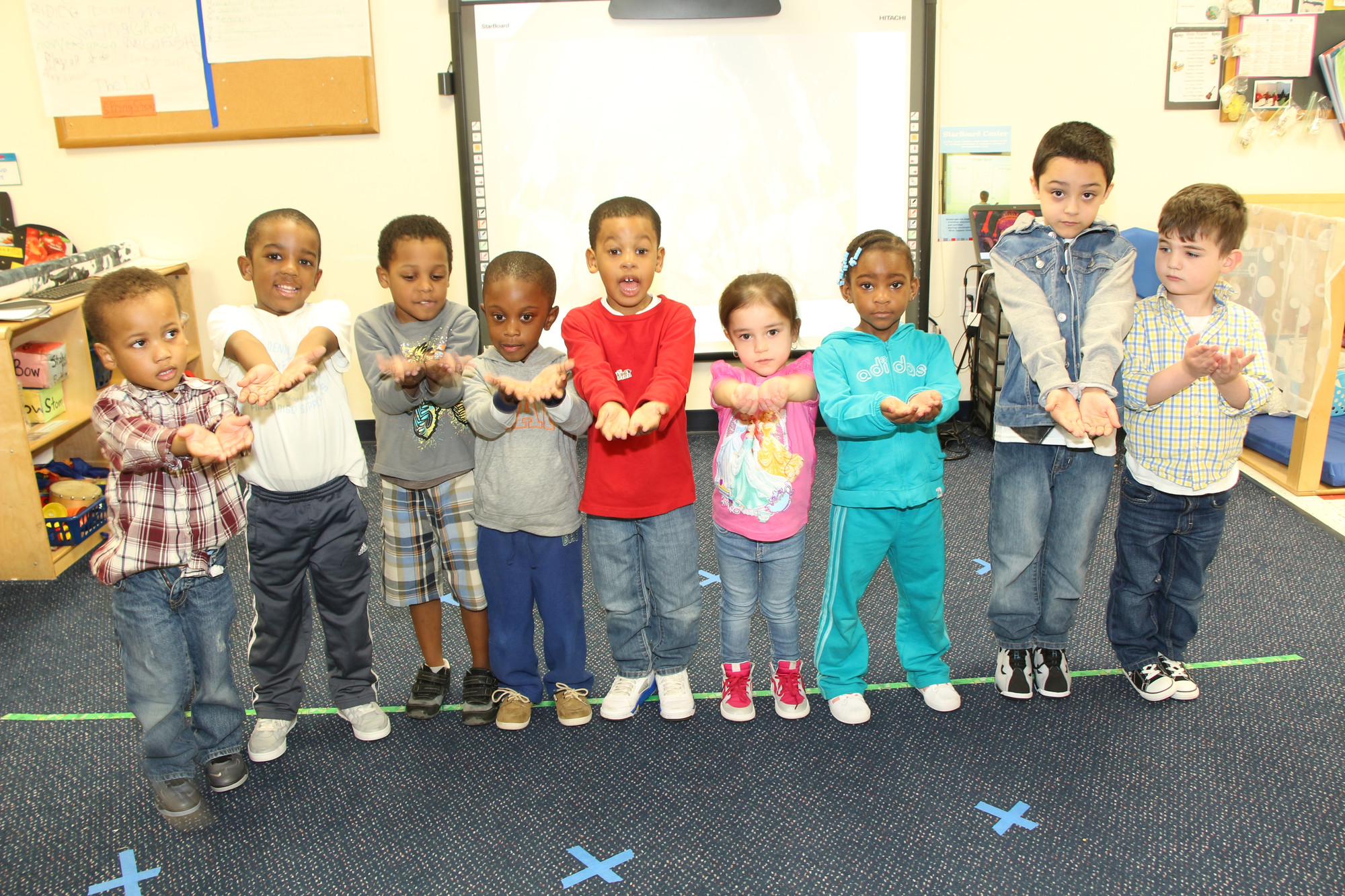 Students at Tutor Time sang and danced their hearts out. From left are Griffin Reyer, Ethan Francois, Victoria White, Julian Bishop, Johanna Gonzalez, Jaelee Gonzalez, Ezekiel Backman, Jace Owens and Jonathan Greenridge.