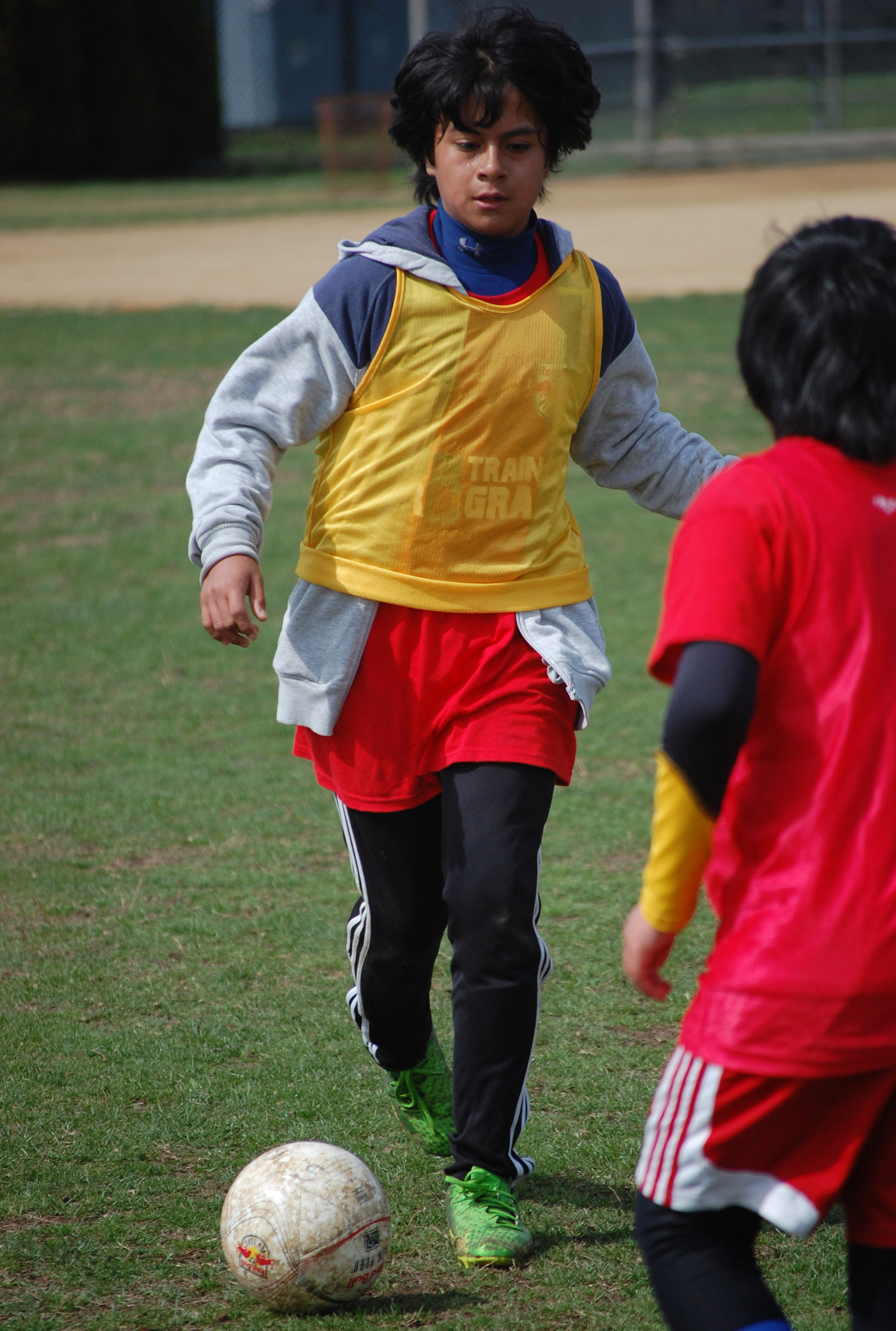 Mike Martinez, 12, practices his soccer skills.