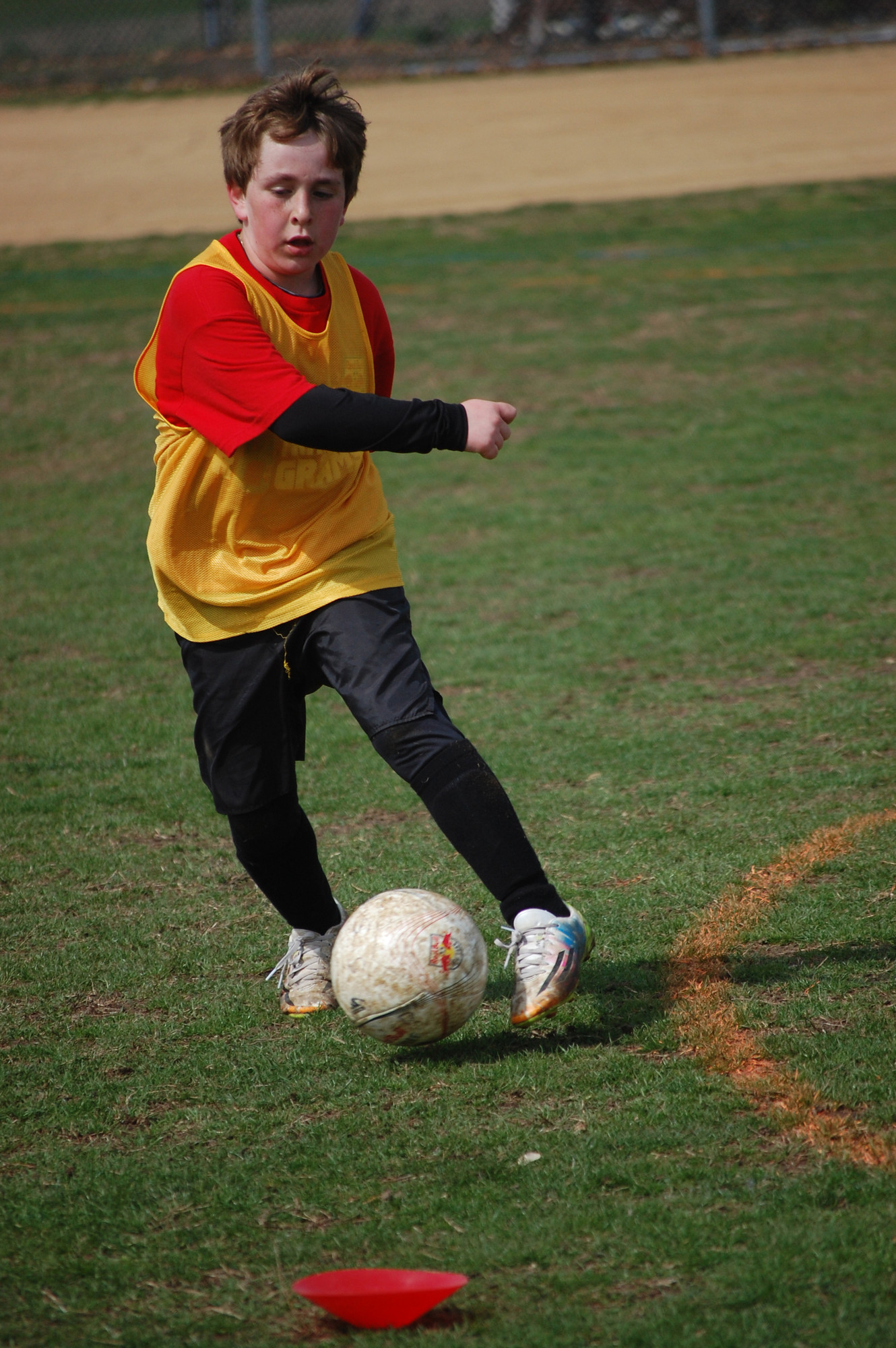 Fletcher Goodman, 10, a student at Ogden Elementary School, showed off his footwork during the soccer clinic.