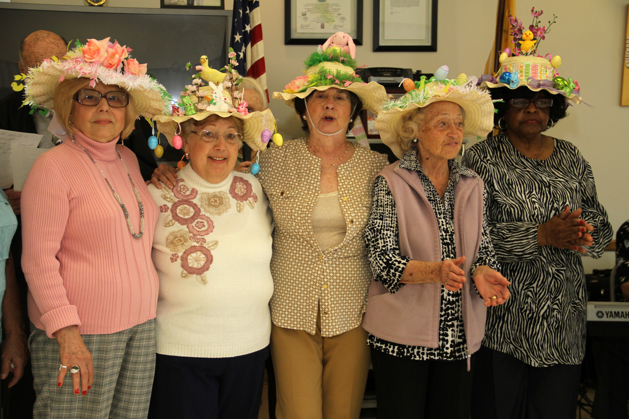 The seniors spent several weeks working on their festive bonnets. From left are Josephina Bellina, Rose LaBruna, Mary Bertelle, Catherine Radnow and Eunice Brewster.