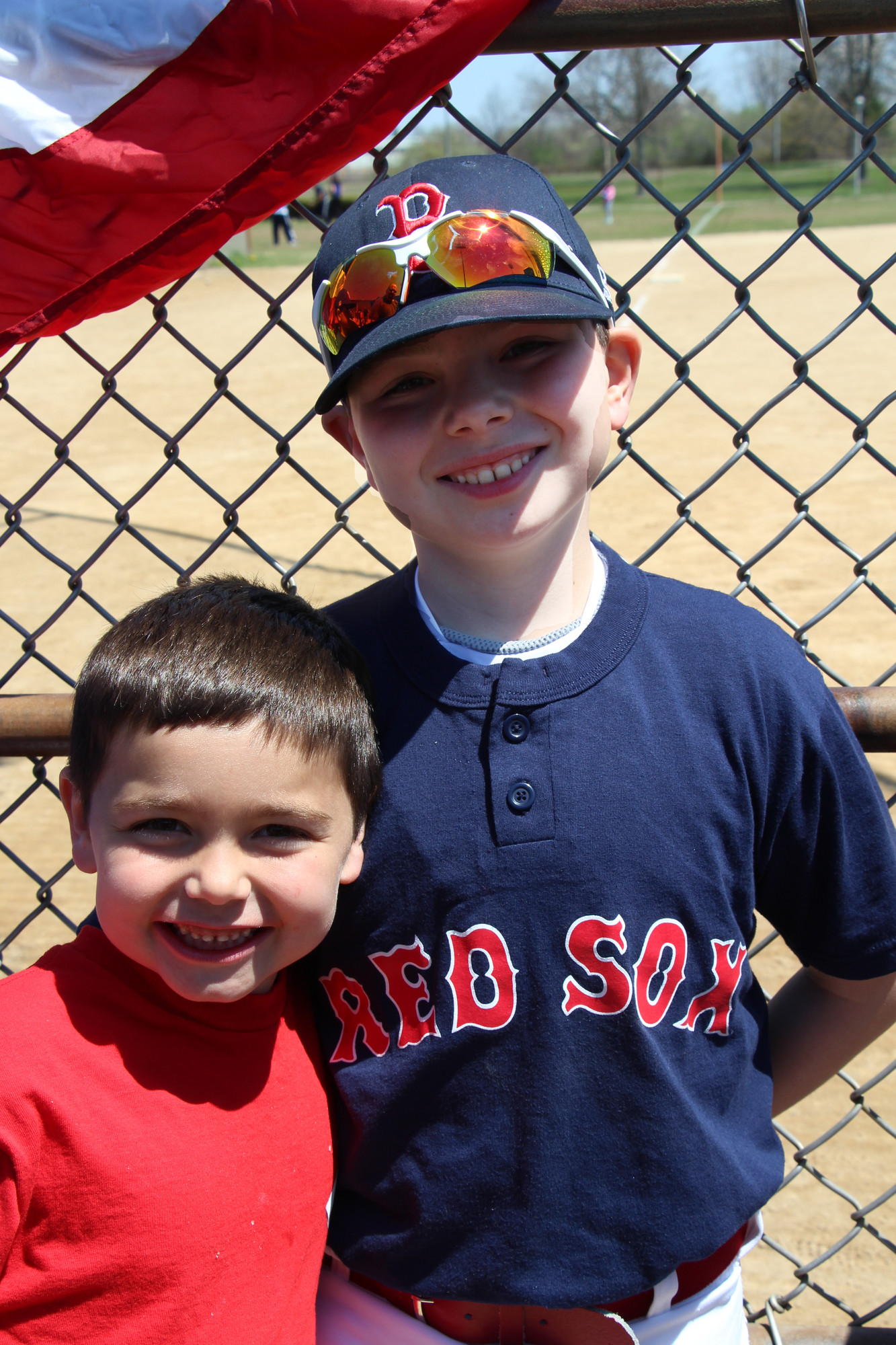 The Carney Brothers Ryan, 7, of the Reds  and John Jr., 10, who plays for the Red Sox were all smiles.