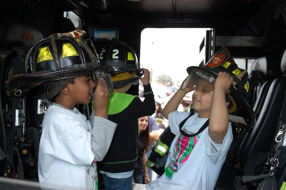 Local nursery school students got to check out the equipment on a fire engine at the annual Truck Day program at Hendrickson Park.