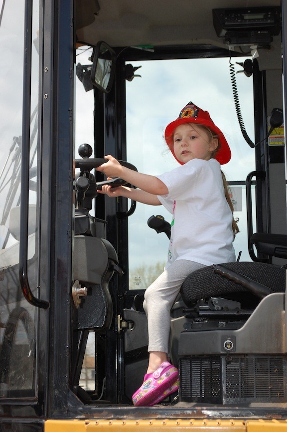 Page Thingelstad, 5, was at the controls of a bulldozer.