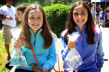 Kara Piplier, left, and Caroline Giacone, proudly displayed the fish they won.