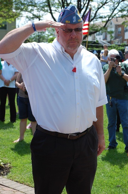 John LaBarbera, of the Sons of the American Legion, paid tribute at the monument on the Village Green.