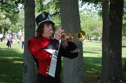 James Milne, of the South High School band, played taps.