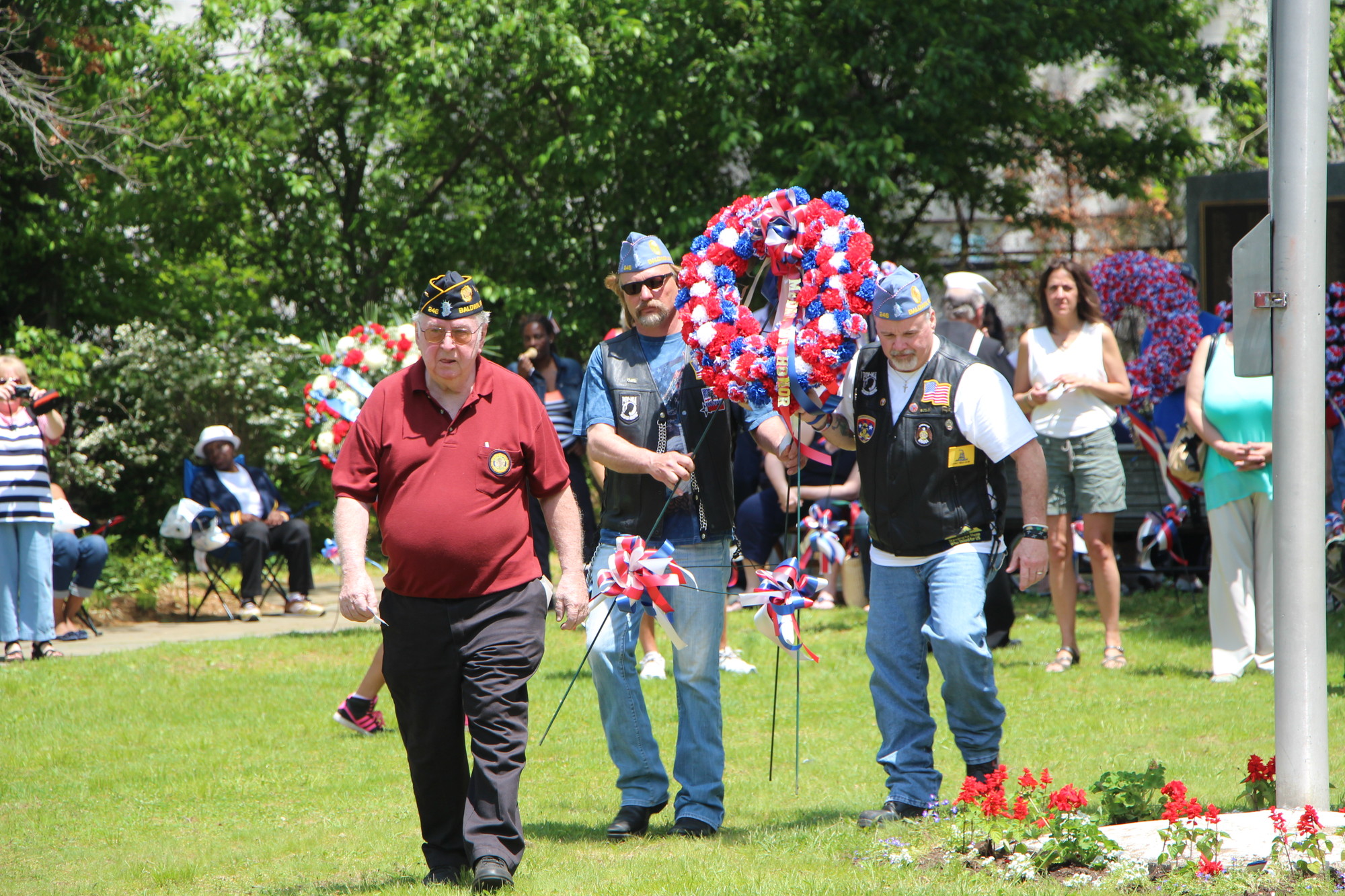 Members of Baldwin American Legion Post 246 laid wreaths at Silver Lake Park to honor veterans who lost their lives.