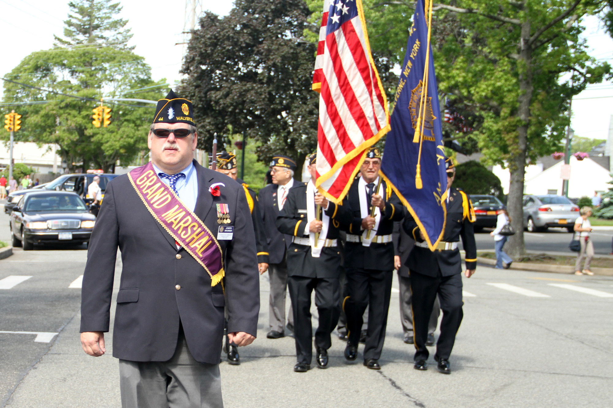 Grand Marshall Commander Joseph Brunner, American Legion Post #44, leads the parade.