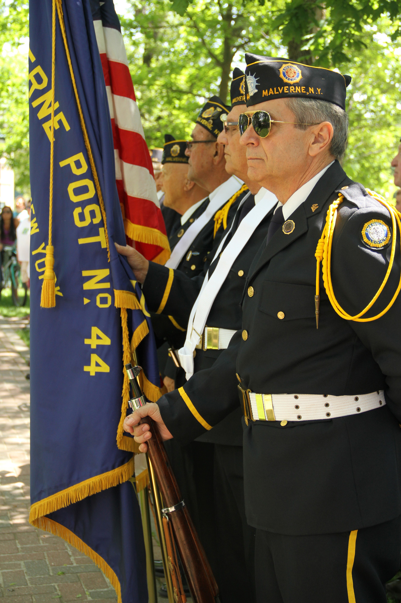 The Color Guard stands at attention during the ceremony.