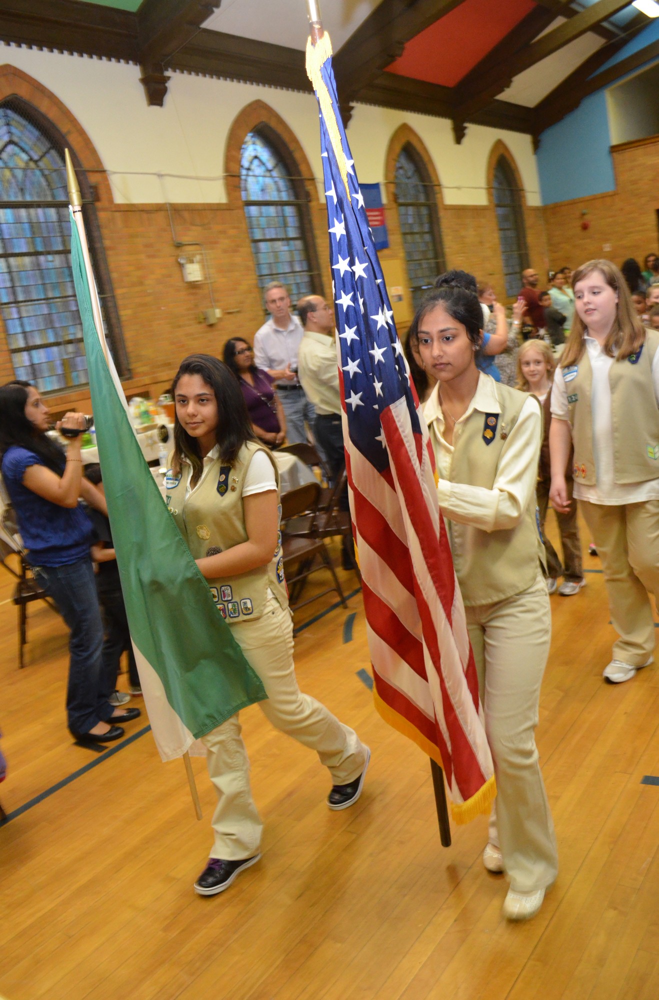 A Girl Scout Color Guard opened the ceremony at Holy Name of Mary School.