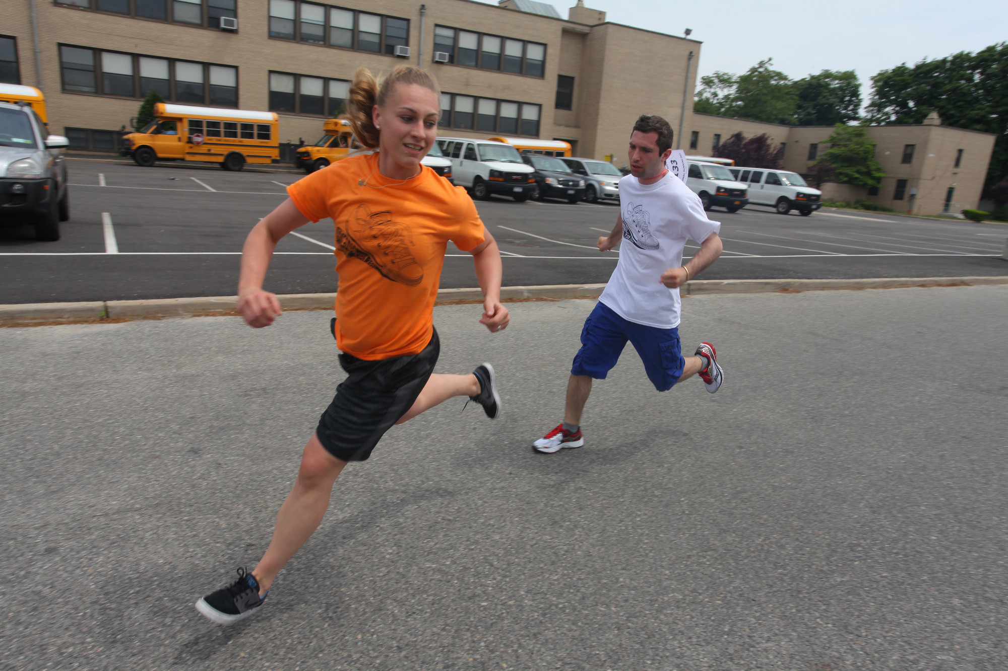 Bridget raced with Genesis student, Alex, outside St. Raphael’s Parish on Newbridge Road. According to the Genesis School, individuals with autism are at a high risk of  obesity.
