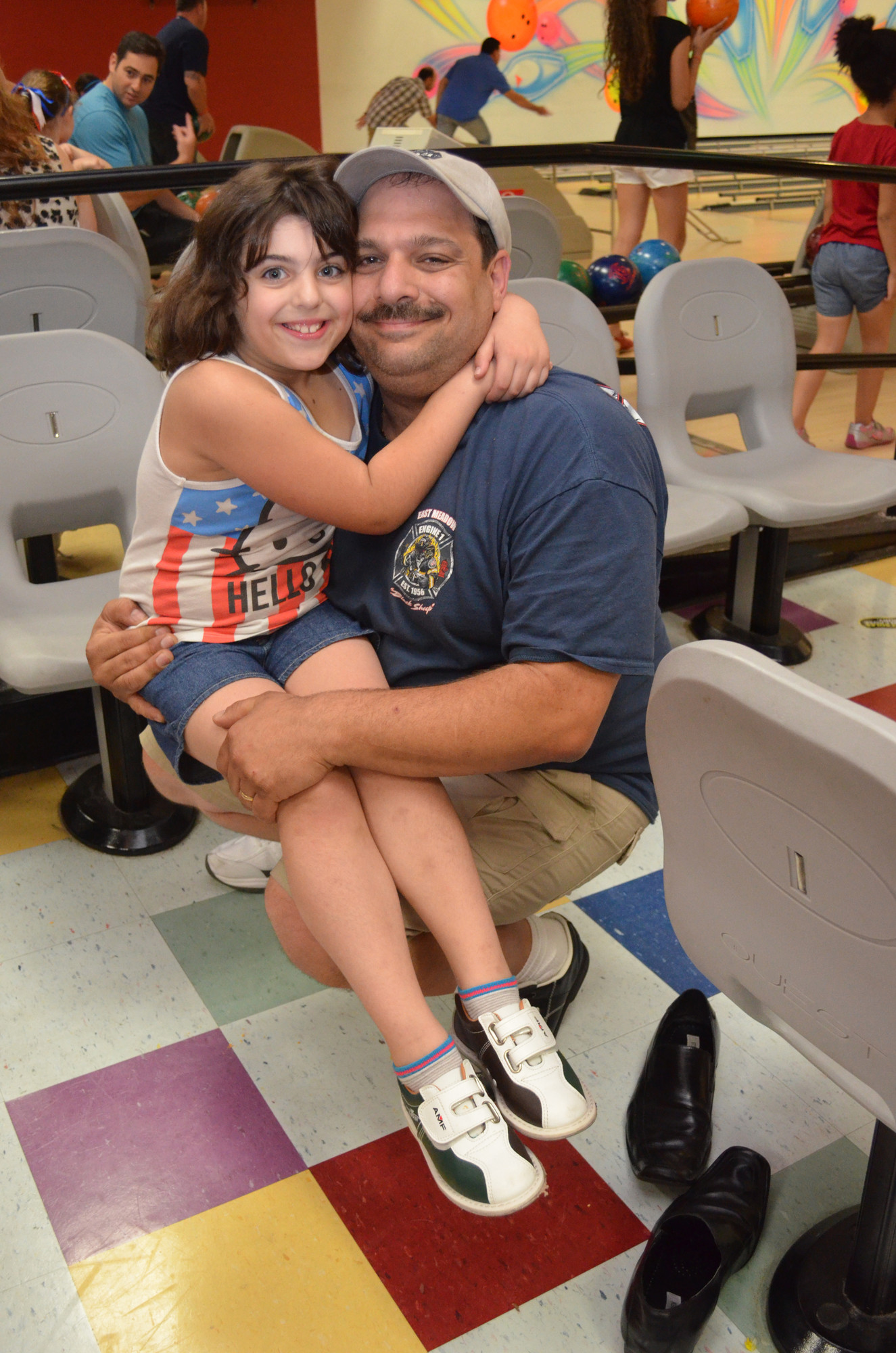 Jaclyn Sisca, 7, struck a pose with her dad, Marty.