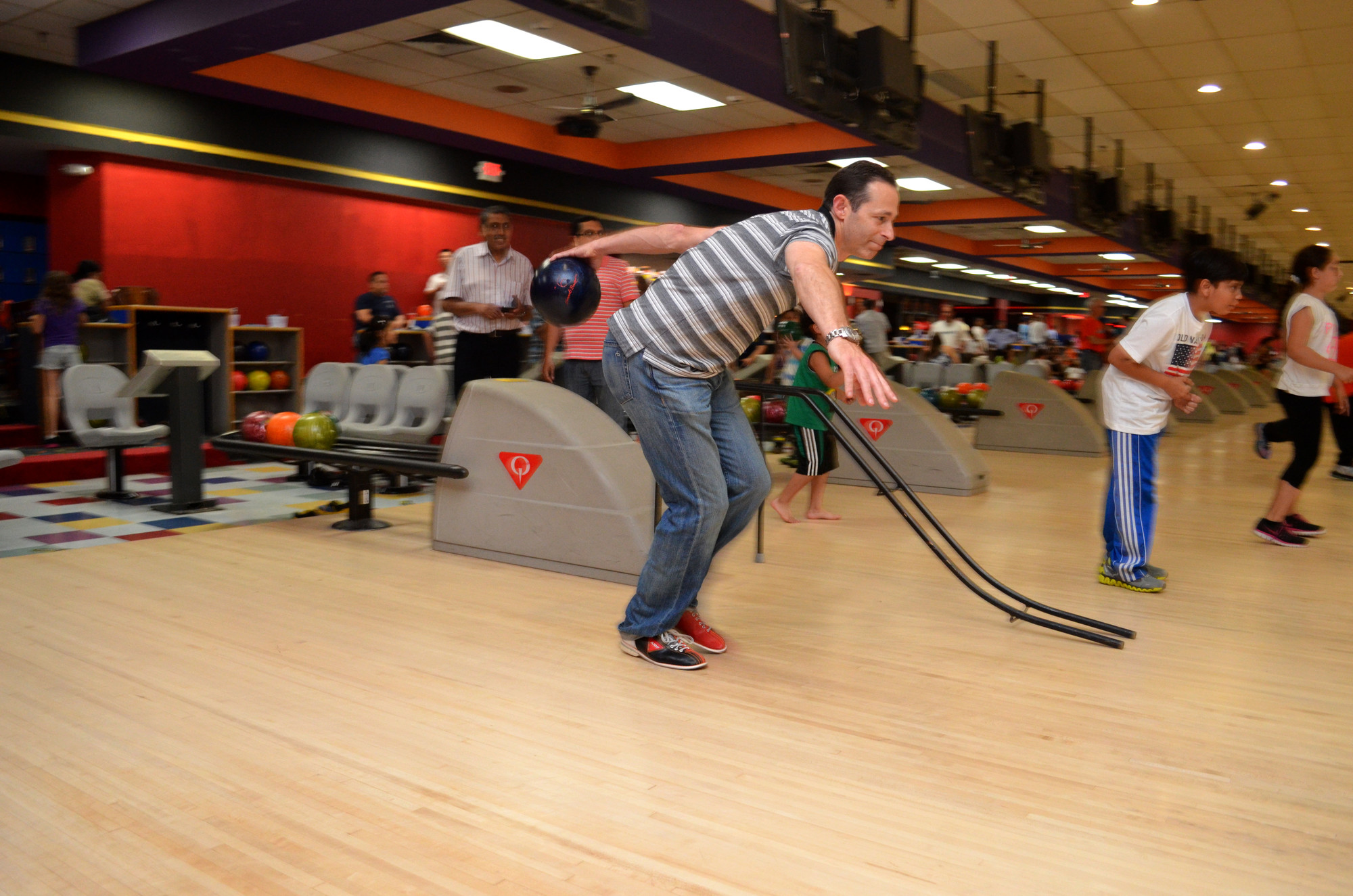 Adam Ashe lined up his shot at the Barnum Woods PTA’s Father’s Day bowling night.