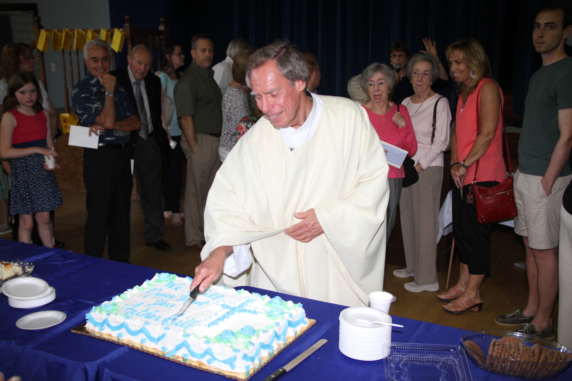 Parishoners hosted a gala in the Our Lady of Peace school to honor Father Bill Breslawski after he celebrated his last Mass at the Lynbrook church.