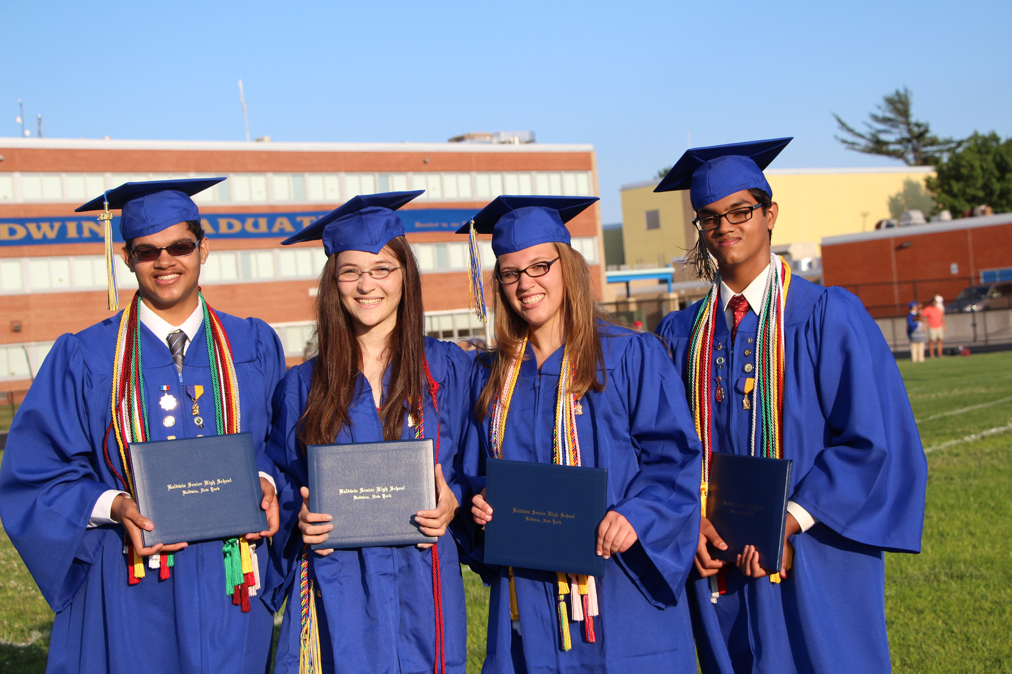 Baldwin High School’s class of 2014 graduated on June 27 in front of family and friends. From left were Vineet Vishwanath, Virigia Lee, Kirsten Watts and Vikram Vishwanath.