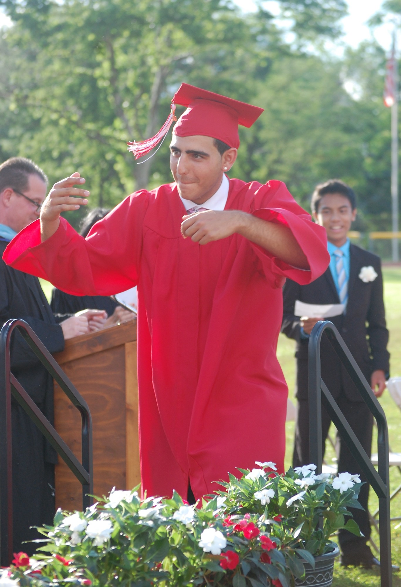 Anthony Arnone went up with some flair to receive his diploma on June 26.