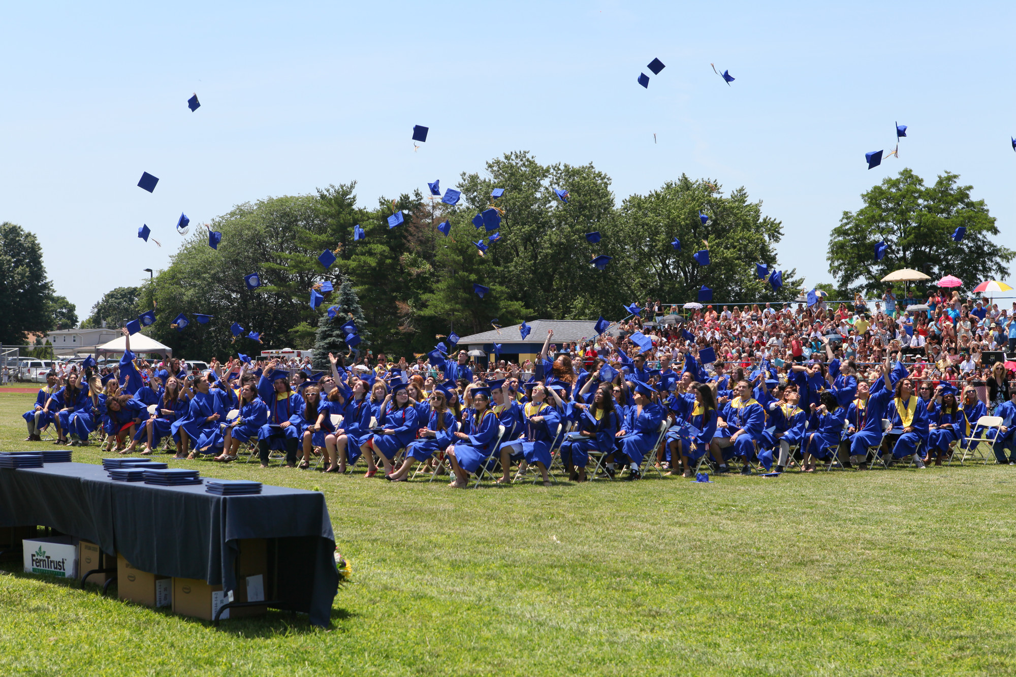 Students threw their caps in celebration as the East Meadow High School graduation ceremony concluded on June 29.