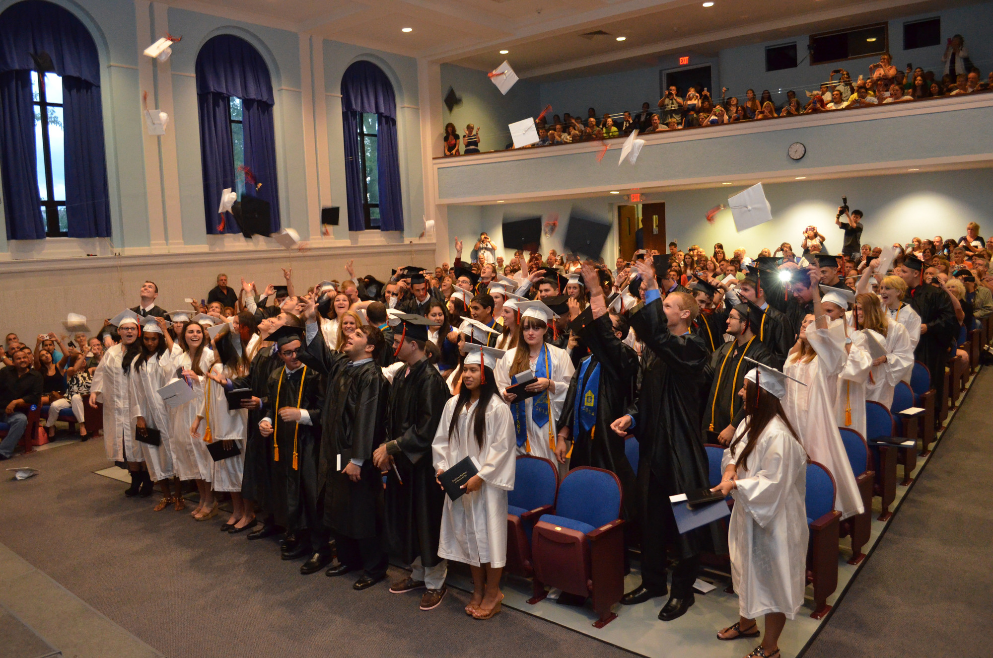 The Class of 2014 threw their hats up in the air as they were pronounced as graduated seniors.
